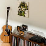 Two packs of premium acrylic media holders arranged side by side on a minimalist living room bookshelf.