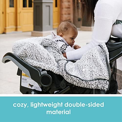 Side profile of JJ Cole Cuddly Car Seat Cover on infant carrier