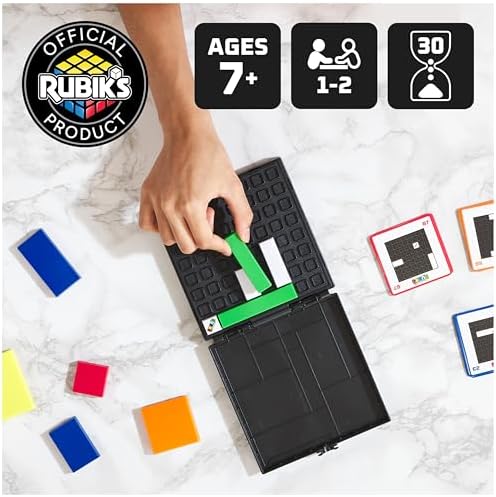 Rubik's Gridlock strategy game travel case opened with colored blocks inside.