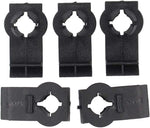 Molded black plastic vehicle window clips close up