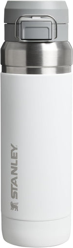 Authentic USA imported Stanley water bottle placed on a fitness mat.