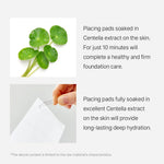 Textured shot of a wet calming skin pad saturated with clear hydrating Centella essence