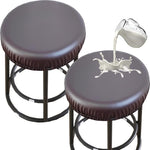 Set of four gray round bar stool covers laid flat