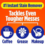 Compact Tide stain remover stick being used on a white shirt