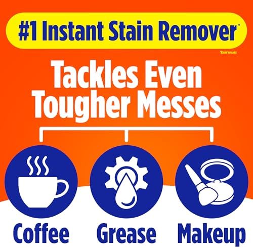 Compact Tide stain remover stick being used on a white shirt
