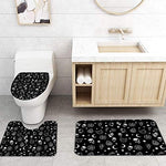 Included twelve piece plastic C shaped curtain hooks demonstrated alongside the black witchy shower curtain header.