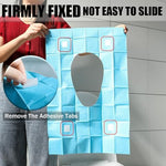 Four adhesive tabs on the underside of blue travel toilet seat covers