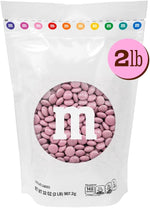 Pink bulk chocolate candies from M&M'S WORLD for baby shower decorations