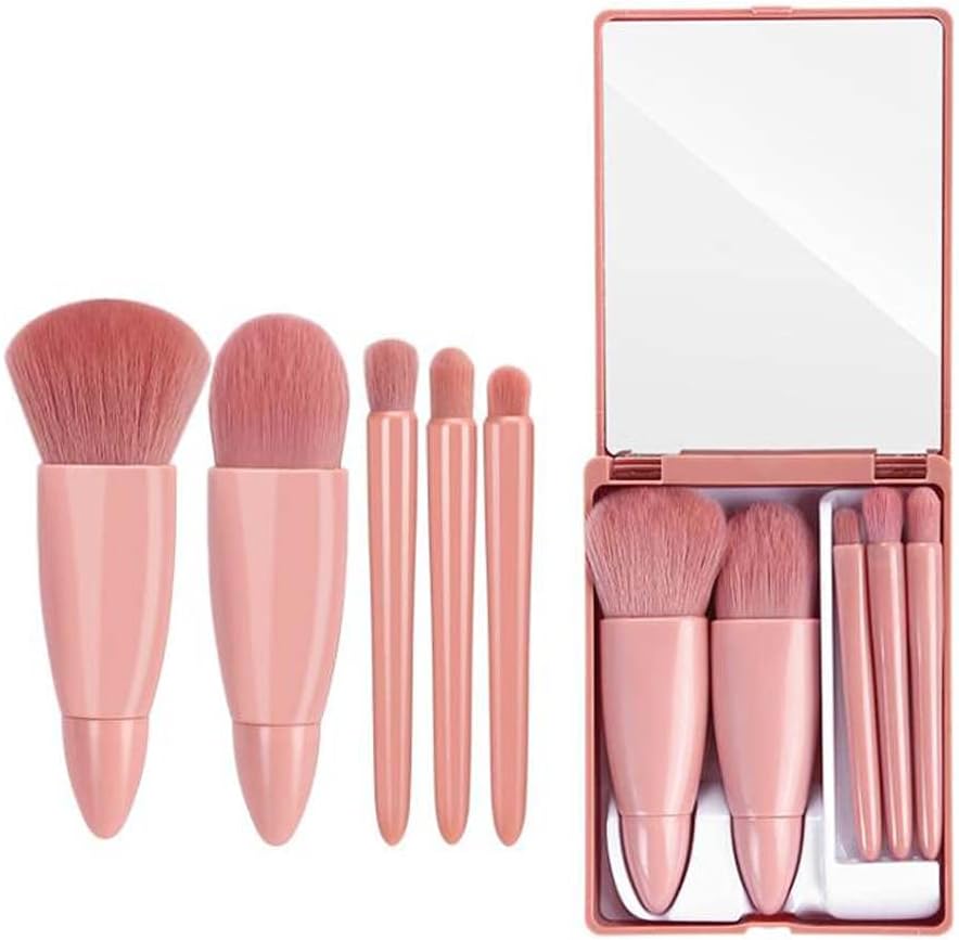 COSHINE travel makeup brush set front view showing five pink mini cosmetic brushes arranged inside the compact pink storage case with mirror