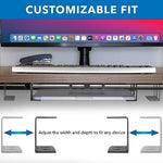 Mount-It! black steel laptop rack installed under table