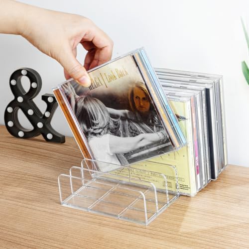 Vowcarol clear acrylic CD organizers stacked vertically to optimize desk space.