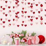 Glitter and metallic paper heart decorations for wedding anniversary