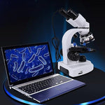 Dpofirs biological microscope showing the three rotating achromatic objective lenses close up