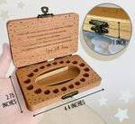 20 Moments of Tooth keepsake box displayed as a gift on a table