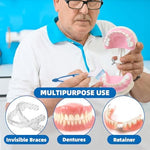 Dual-head denture cleaning brush with multi-tufted bristles for stain removal.