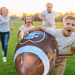 GiftExpress oversized inflatable football placed on its sturdy inflatable tee setup.
