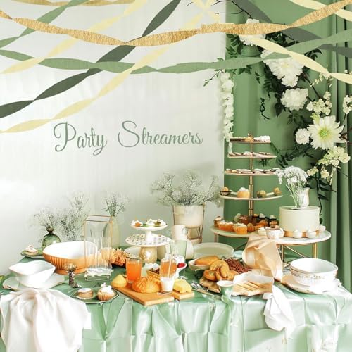 Kiwayo pastel paper streamers hanging from the ceiling to create a woodland safari themed backdrop.