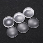 Optical glass lenses arranged for light refraction experiment