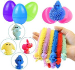 Tactile bunny and chick stretchy noodle toys extended out of open holiday prize eggs