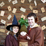 Wizard theme party venue decorated with durable vintage paper envelope garland supplies