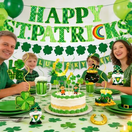 Glittery green four leaf clover garlands hanging across an elegant indoor fireplace mantel.