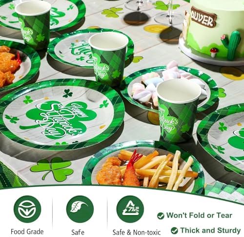 Shamrock pattern tablecloth laid out for party setup