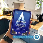 Close up of the non acidic Astonish kitchen cleaner paste texture on a damp sponge.