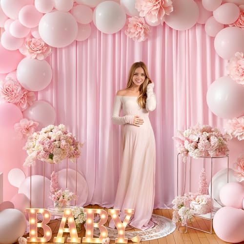 Partisky light pink background curtains showing pole pocket installation close up