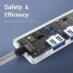 Tymyp USB hub plugged into a laptop with peripheral accessories