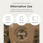 Two boxes of Grab Green Oak Tree scent laundry sheets arranged on a rustic wooden countertop