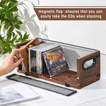 Geelin vintage media container loaded with thirty six movie discs and music cases