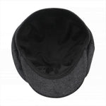 Jerague ivy cap displayed on a flat surface showing adjustable strap detail