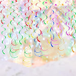 Shimmering multi-colored spiral foil decorations installed outdoors for a graduation party background.