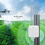 WAVLINK long range outdoor access point mounted securely on an exterior wall overlooking a large country farm estate setup.