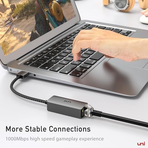 uni USB 3.0 male connector snugly fitting into a premium laptop port for network setup