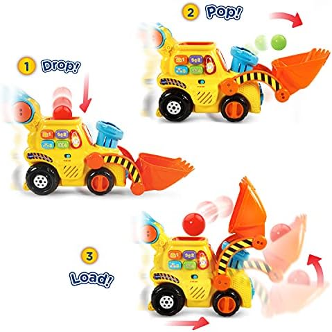 VTech construction push toy highlighting the side number buttons and yellow plastic chassis detail