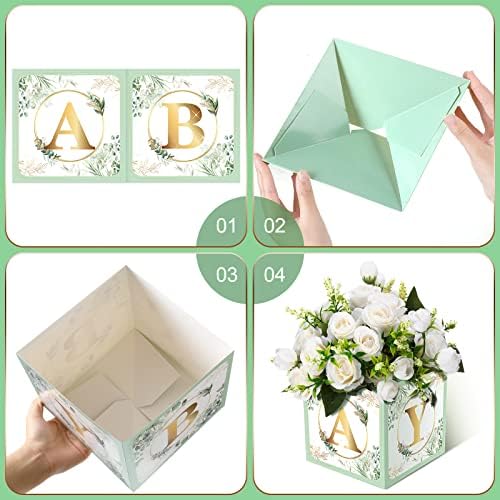 Close up of sage green floral patterned party favor boxes