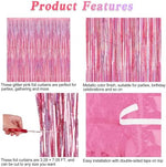 Trimming the bottom of the pink metallic foil fringe curtain with scissors for custom height adjustment