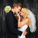 Product packaging for the Forlvwoon two pack black tinsel curtains for holiday celebrations.