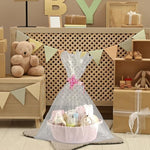 APOMOONS pink regular size gift basket wrapped in its clear cellophane bag with a tied pull ribbon.