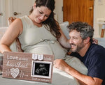Close up view of the interchangeable pregnancy week numbers on the Garybank wooden baby announcement frame