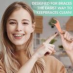 Dr. Emma dental flossers being used to clean around orthodontic brackets and wires.