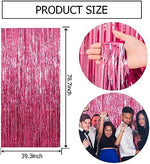 Glossy pink metallic backdrop streamers reflecting lights for a premium party atmosphere.