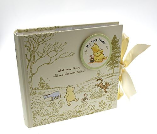 Side angle view of the Disney Classic Pooh heritage photo album with ribbon closure.