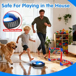 Qirptey multi color glowing floating soccer disc sliding across a tiled living room floor