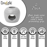 Close up of Driddle door knob safety lock showing finger holes