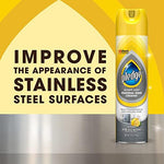 Pledge Stainless Steel Cleaner Spray removing fingerprints from a refrigerator surface