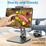 ROADOM adjustable tablet holder showing three hundred sixty degree rotation capability.