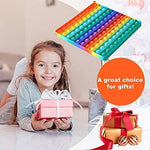 Two players practicing mathematical counting games on the colorful square educational board