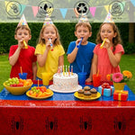Three pack of spider web party tablecloths folded for display